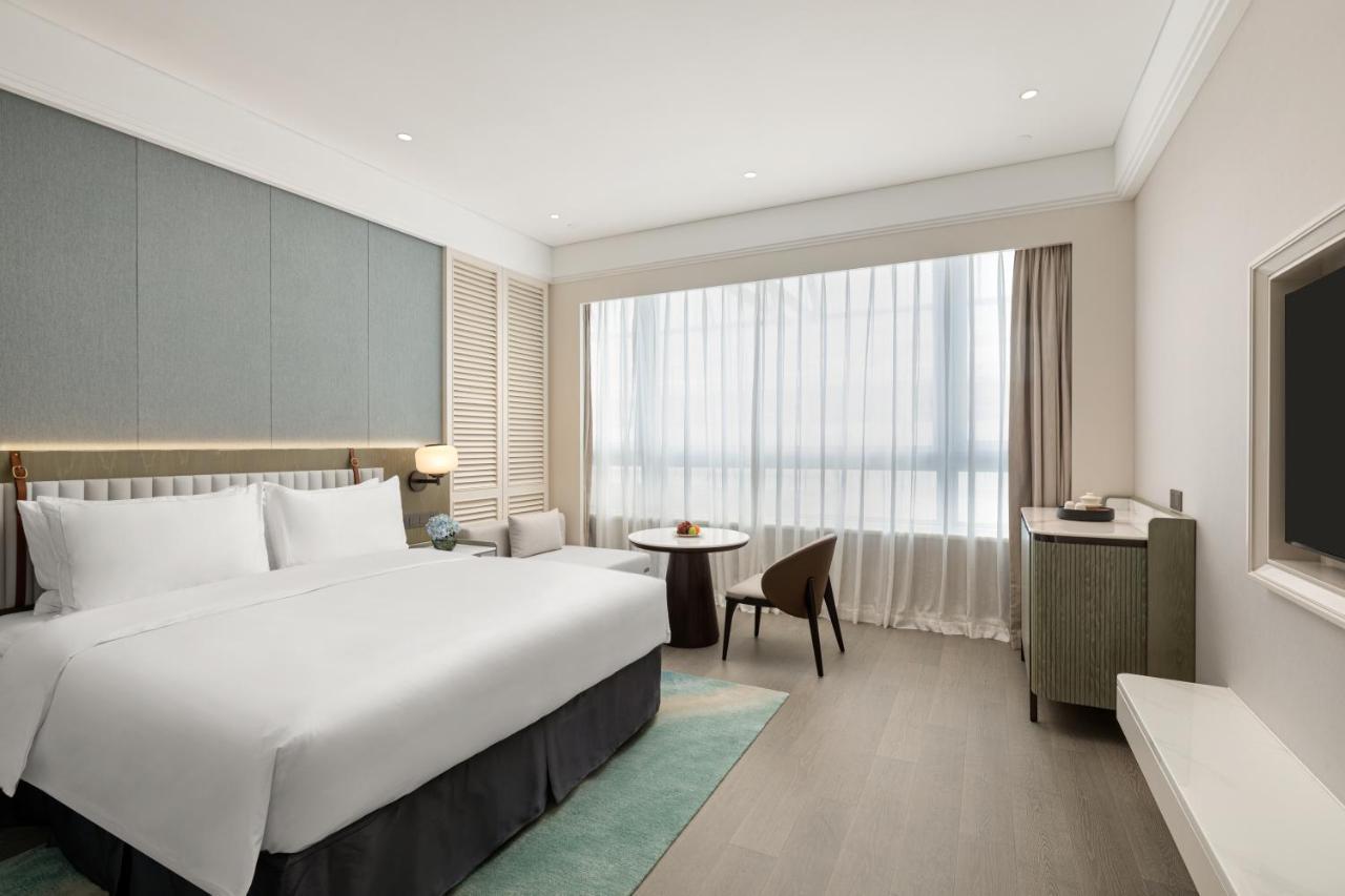 Xiamen International Seaside Hotel -Hotel Corridor Leads To The Stone Exhibition Hall Exterior foto