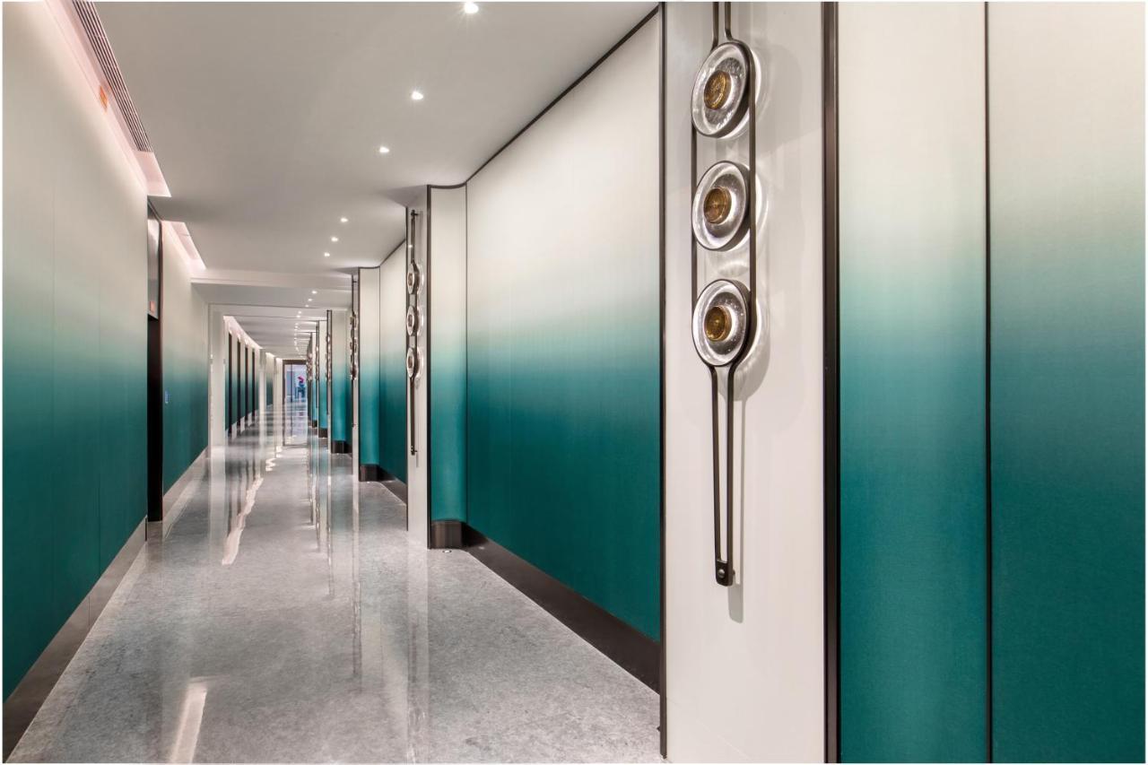 Xiamen International Seaside Hotel -Hotel Corridor Leads To The Stone Exhibition Hall Exterior foto